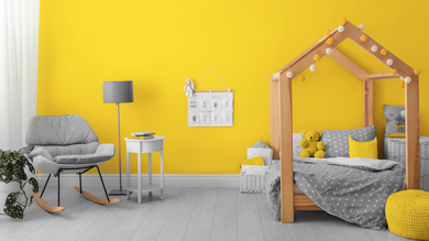 yellow wall and grey interior of children's room